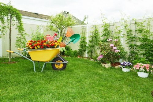 Modern New Cross garden design with seating and greenery